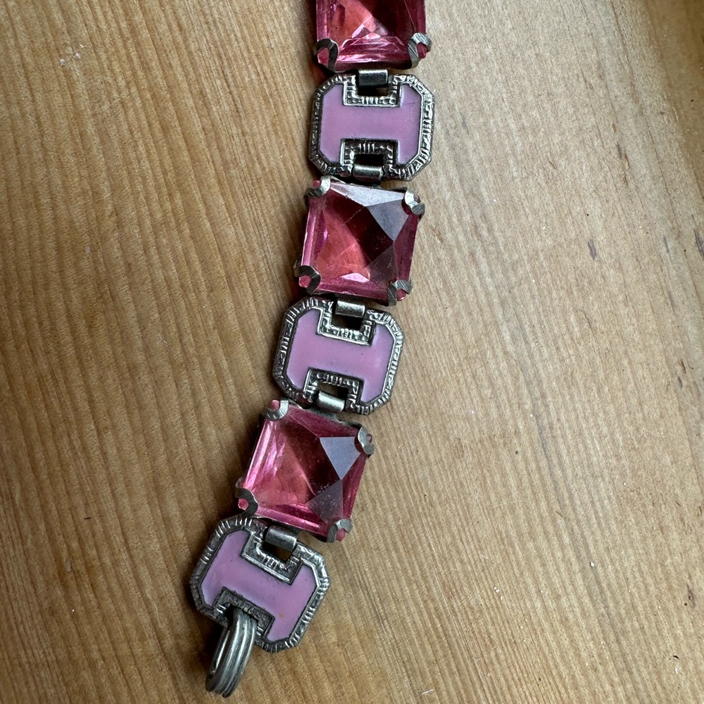 Vintage bracelet with pink glass stones and enamel.